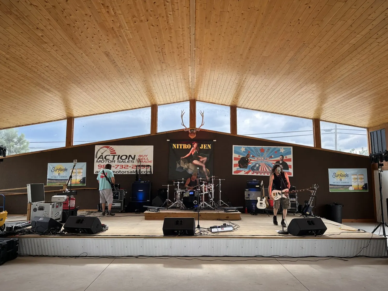 A live band playing on the large stage at The Lakeside Pavilion